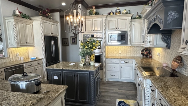 Kitchen cabinet painting project—refinished cabinets and updated colors by GC LLC in Edmond, OK